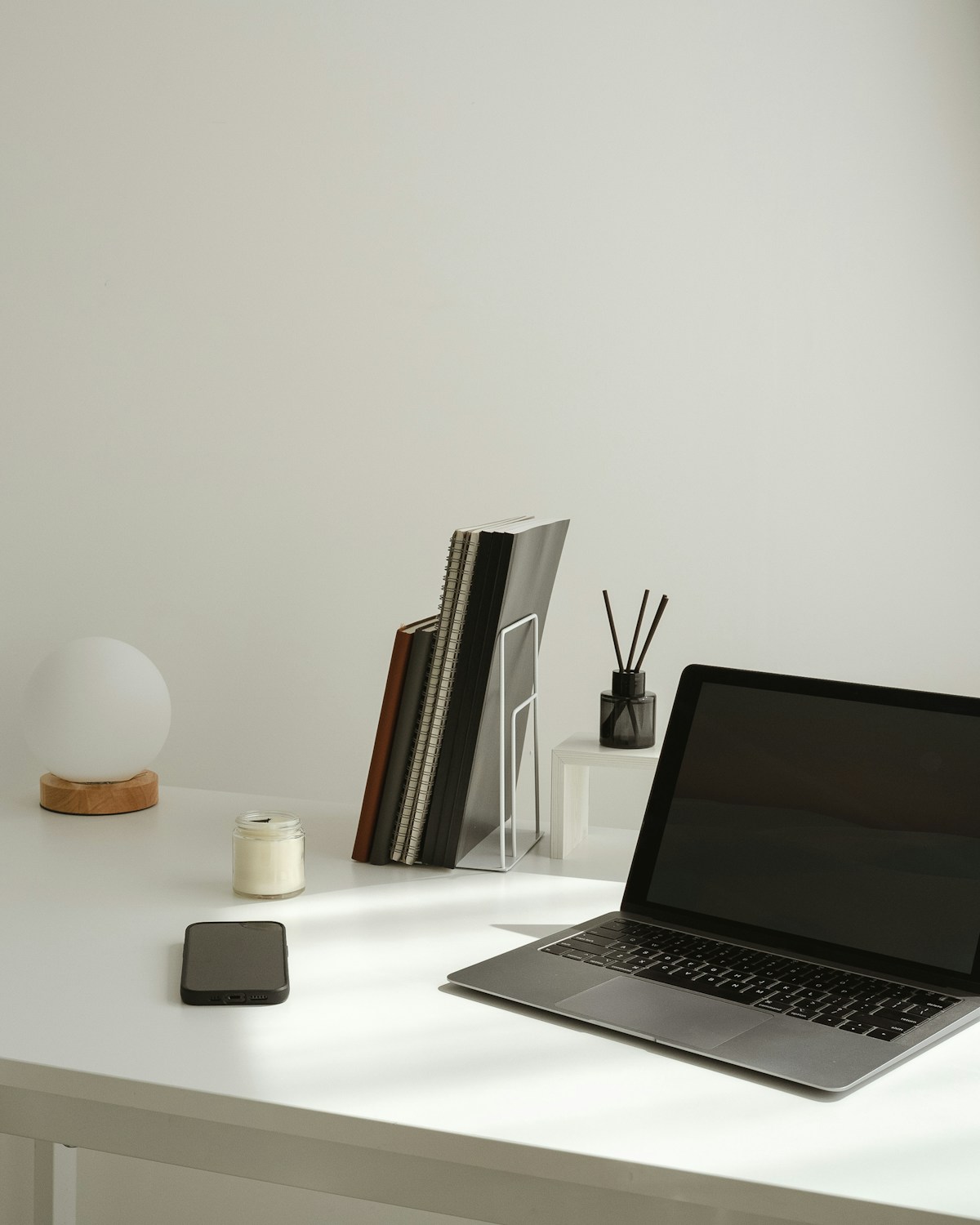 Minimal workspace with laptop — modern Southeast Asian startup environment
